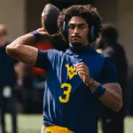 WVU quarterback Hawkins has calm, collected confidence
